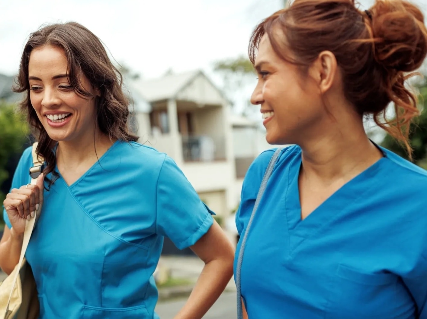 Nurse colleagues walking outdoors